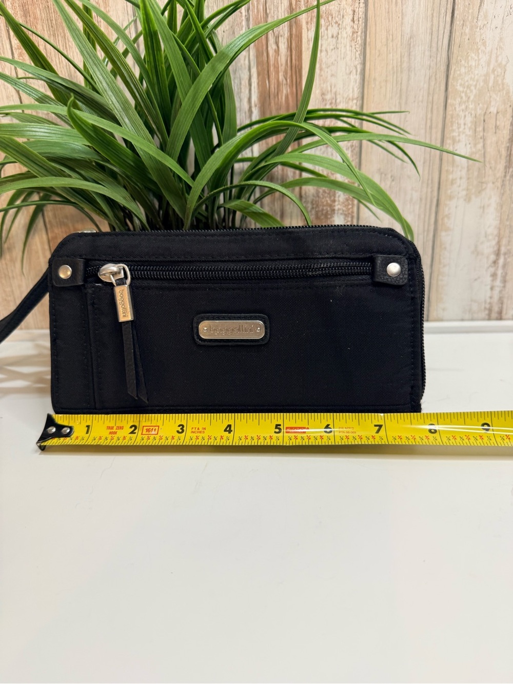Baggallini Zip Around Wallet featuring a wrist strap and RFID protection, Black - Picture 7 of 8